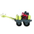 Hand operated diesel engine starting road roller