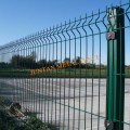 Welded double wire mesh fence with barbed wire