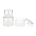 wholesale 10g 20g 30g 50g 100g sustainable transparent glass cosmetic jars frosted with silver lids