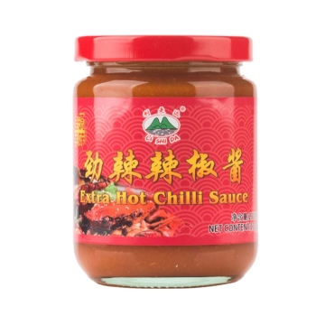 Traditional super chili sauce on the dinner table