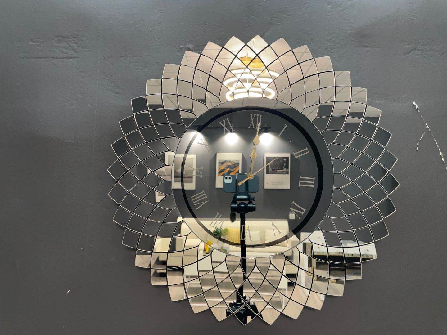 Mirror wall clock made of glass