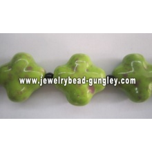 Green color cross shape ceramic beads