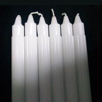 10 inch white taper candles burning ribbed candles