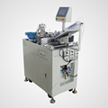 Automatic electronic component sleeve magnetic bead machine