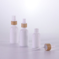 White glass bottle with bamboo mist sprayers