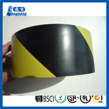 Piso del PVC negro amarillo marca cinta de advertencia