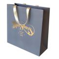 Golden foil shopping bags white kraft color paper