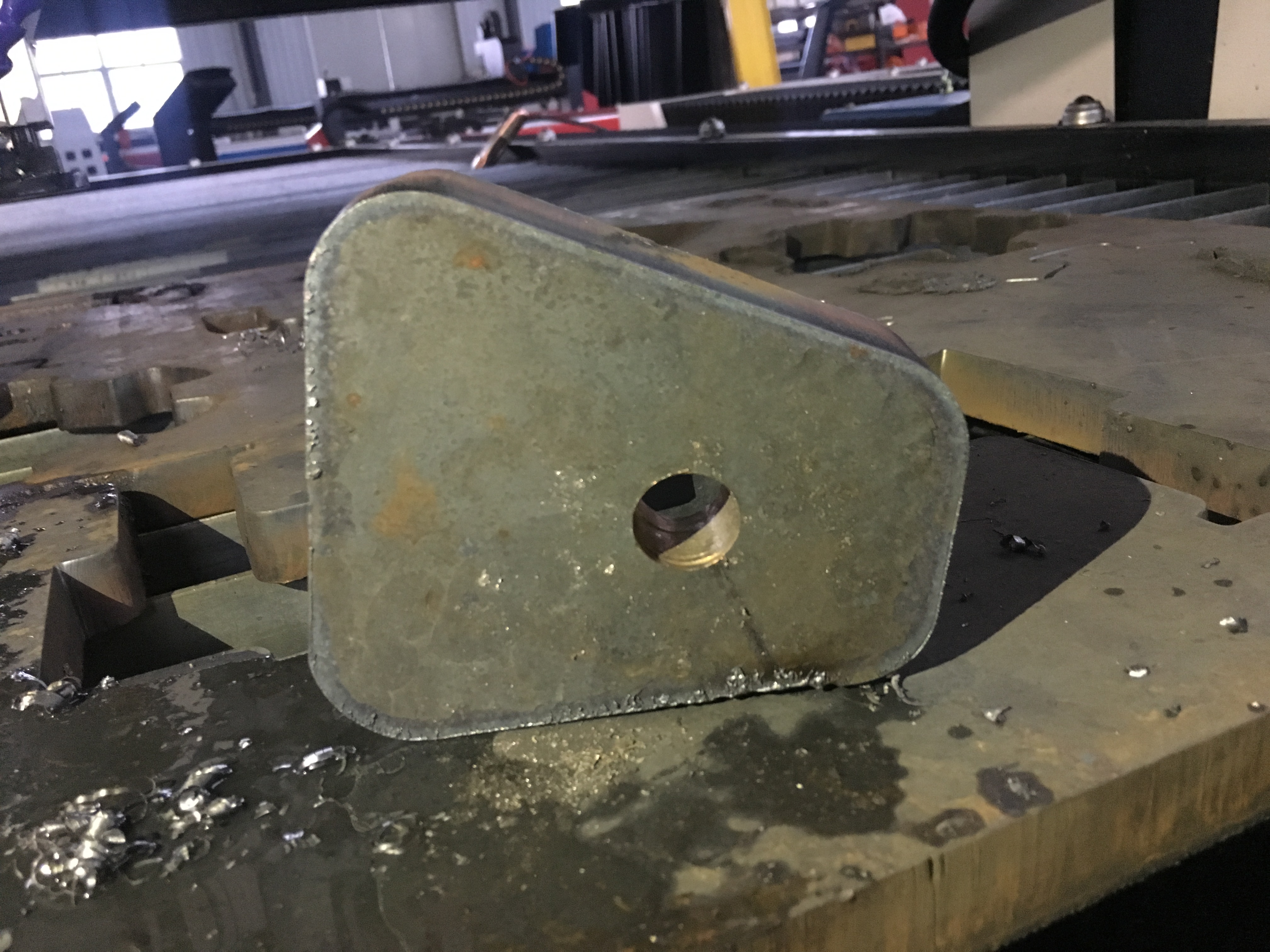 Drilling and plasma cutting hole