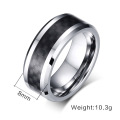 Tungsten carbide ring with carbon fiber inlay