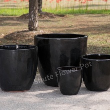 Baratos vasos de barro vitrificados pretos