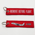 personalized remove before flight embroidered keychain