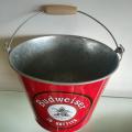 Bucket with wooden handle and bottle opener