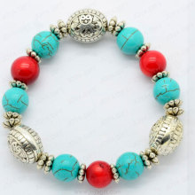 Pulsera de abalorios turquesa de coral rojo.