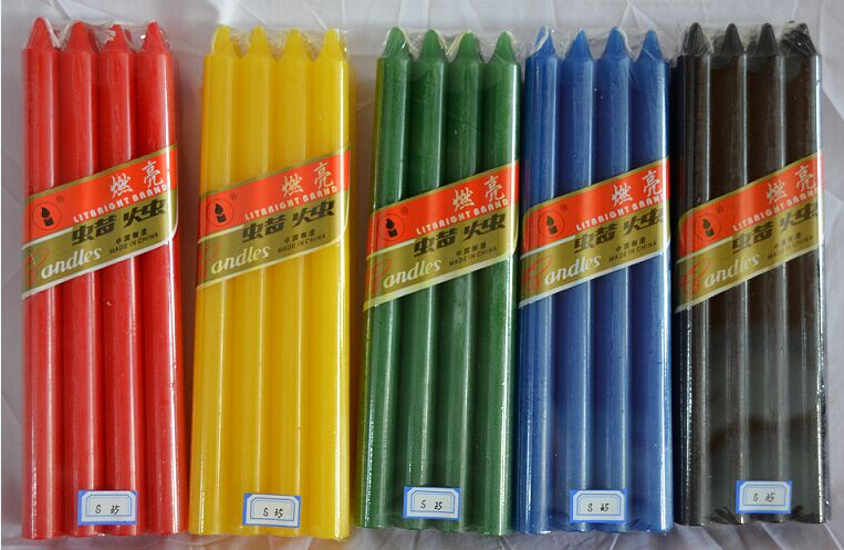 colored candle in cellophane packaging