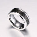 Tungsten carbide ring with carbon fiber inlay