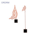 Boucles d&#39;oreilles dormeuses papillon asymétriques en or rose pour filles