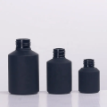 Matte schwarze Glaslotion Flasche Bambuskappen