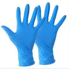 Голубой белый медицинский устранимый порошок перчаток нитрила свободный