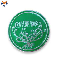 Metal logo round badge holder for handbags