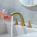 Grifo de baño de oro cepillado con Shamanda con drenaje