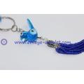 Translucent blue bird evil eye keychain