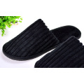 Zapatilla de lana de vellón de coral negro zapatilla de hotel de felpa desechable