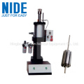 Radiator cooling fan motor armature shaft inserting machine