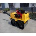 Hand operated diesel engine starting road roller