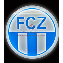 Wandleuchterschild montiertes Sportteam Logo