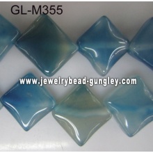 Across corners square agate bead-blue