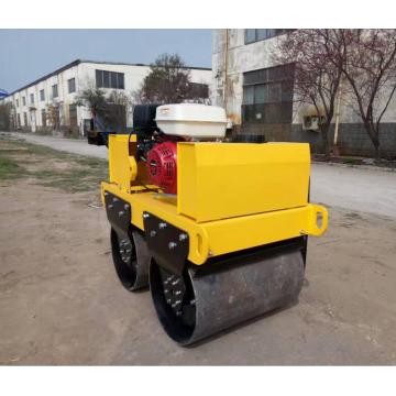 Hand operated diesel engine starting road roller