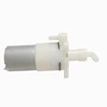 Self priming micro water pump for soap dispenser