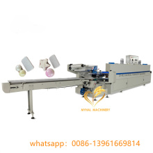 Automatic shrink wrapping machine for bath bombs