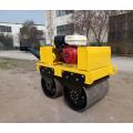 Hand operated diesel engine starting road roller