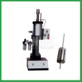 Radiator cooling fan motor armature shaft inserting machine