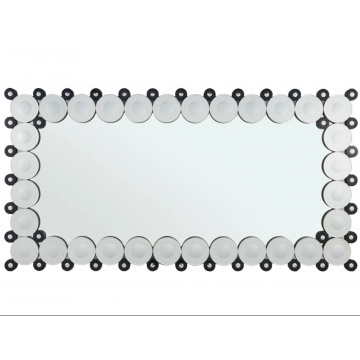 Rectangular bathroom mirror hanging on the wall