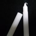 10 inch white taper candles burning ribbed candles