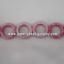 purple donut shape fresh water shell beads