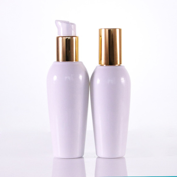 Runde Formlotion Flasche mit goldenen Kappen