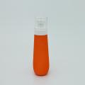 Orange lotion pump bottle