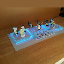 Stand de exibição de telefone celular de acrílico claro personalizado com luz LED