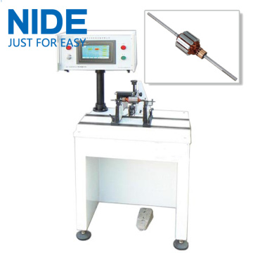 Automatic positioning armature dynamic balancing machine