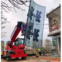 arc-shaped glass installer with Manitou aerocar