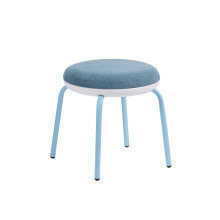 Upholstered stool with metal legs and plastic bottom