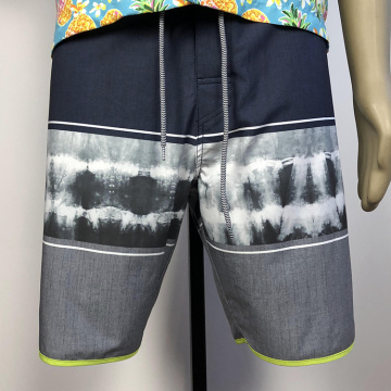 pantalones cortos de playa masculinos estampados con gris negro personalizado