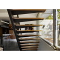 Schwebende Treppe mit Glasgeländer aus Stahl und Holz