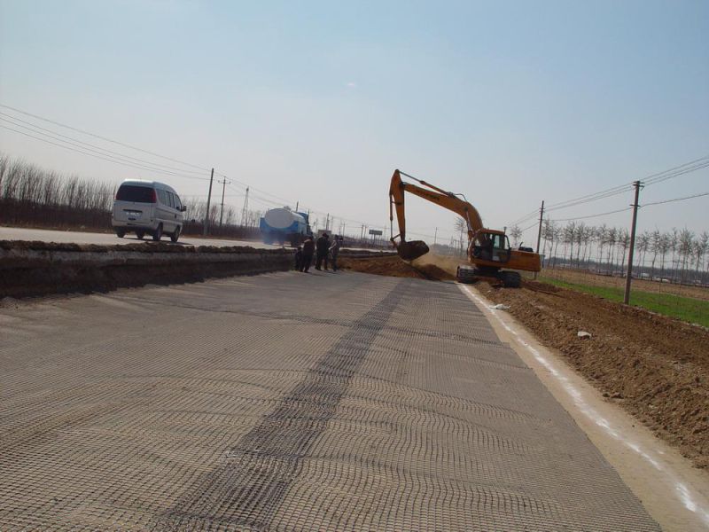 Haisan Bitumen Coated 30/30kn Polyester Pet Geogrid for Road Construction