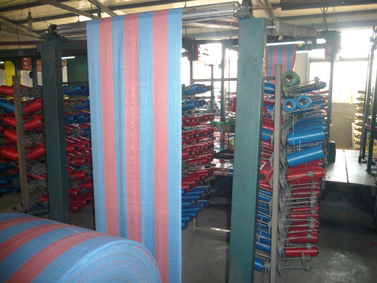 Our Factory Supply PP Woven Tubular Fabric / Flat Fabric in Roll