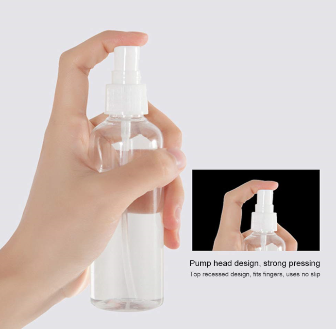 disinfectant bottle with white mist sprayer