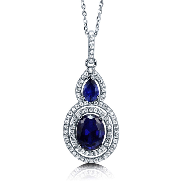 Sterling Silver Oval Simulated Blue Sapphire CZ Halo Pendant